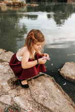 Load image into Gallery viewer, girl in family photo outfit playing outdoors wearing  handmade earth tone neutral lace hair bow in toffee brown