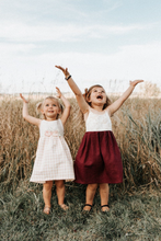 Load image into Gallery viewer, two little girls in vintage style handmade dresses for outdoor family photo with rust brown lace hair bow