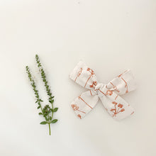 Load image into Gallery viewer, Rust Fall Floral Bows, Boho Fabric Bow Clips or Headbands, Classic Navy Pinwheel Set, Terracotta Gingham Check Bow, Copper Wildflower Bow, handmade fabric bows, boho style baby hair bows, burnt orange gingham check bow, navy floral hair bow, burnt orange floral vintage style hair bow, family pictures hair bow, school pictures hair bow, baby hair clips, handmade in the USA, made in the USA, stocking stuffer for girl, baby shower gift for girl, baby shower prize for girl