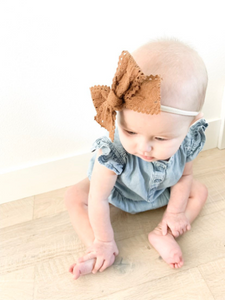 infant girl wearing boho style earth tone lace hair bow