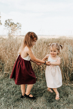 Load image into Gallery viewer, boho style family photo outdoors with toddler girls wearing handmade slow fashion dresses and light brown lace hairbow
