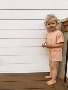 Shorts romper in Neon Blush Rib (3T)